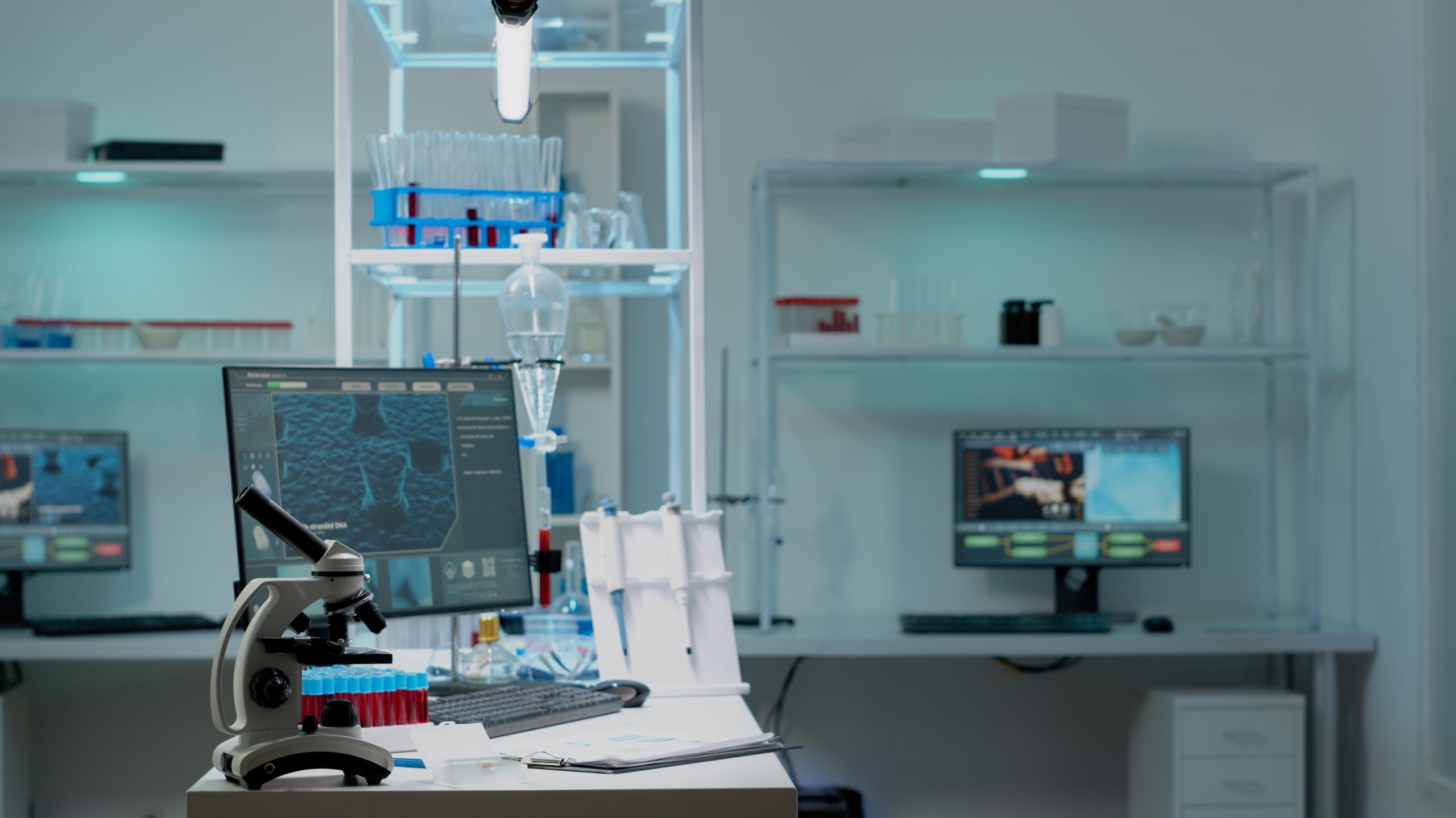Nobody in scientific laboratory with research instruments for healthcare treatment innovation. Empty room of biochemistry labware with computer, test tube, microscope used in development